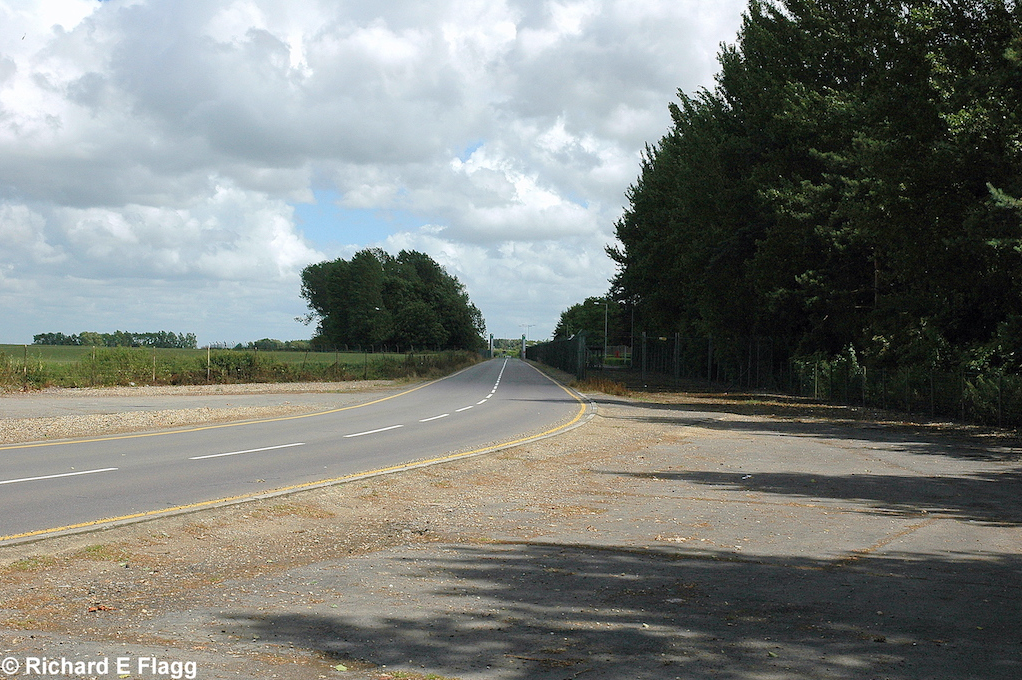 006Taxiway at the west of the airfield. Looking east from near the memorial - 5 July 2008.png