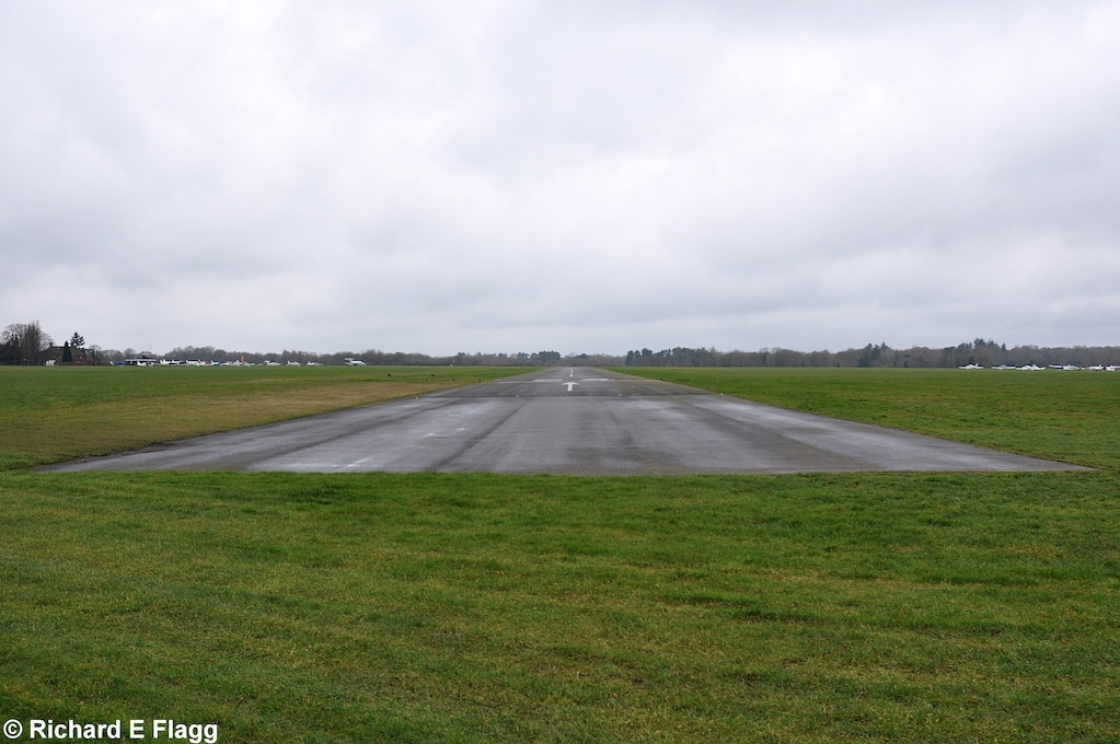 002Runway 06:24. Looking south west from near the runway 24 threshold - 9 February 2013.png