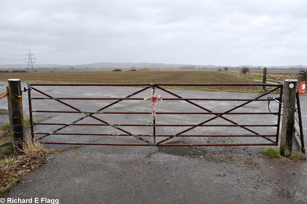 010Taxiway at the west of the airfield. Gate on to the airfield at Wornal Park - 15 March 2013.png