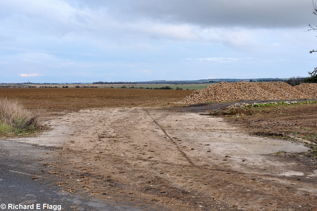 006Taxiway at the east of the airfield. Looking east from London Road - 9 February 2013.png