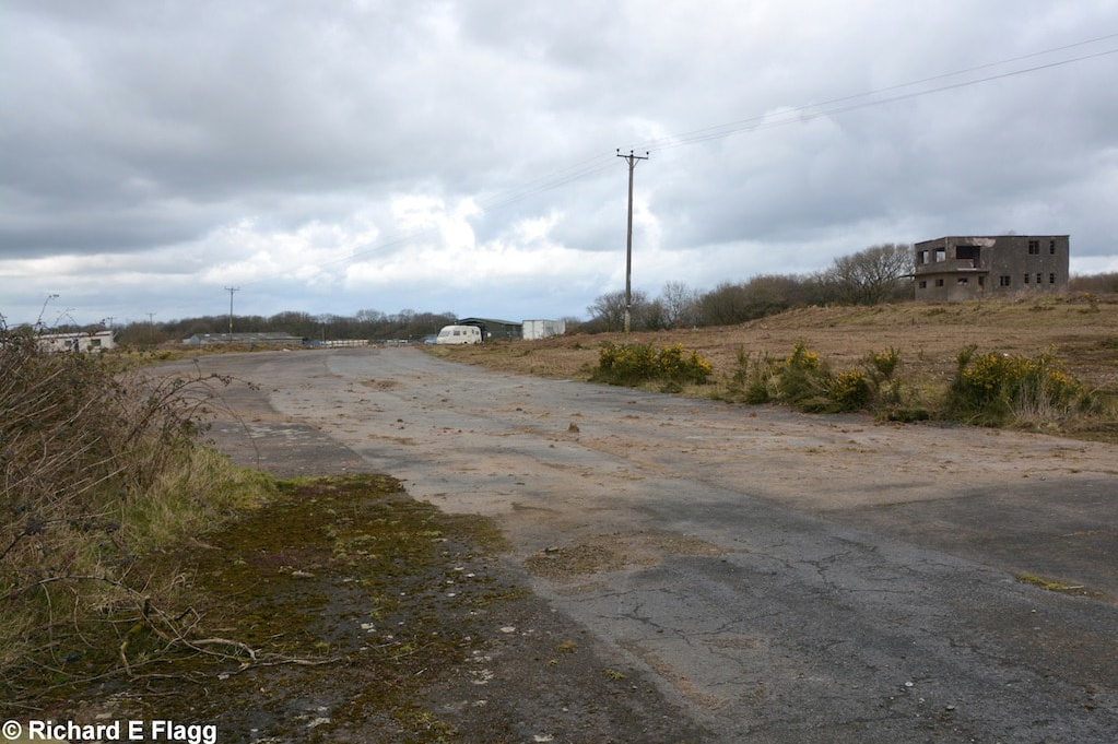 011Taxiway at the east of the airfield. Looking north near the control tower - 7 March 2017.png