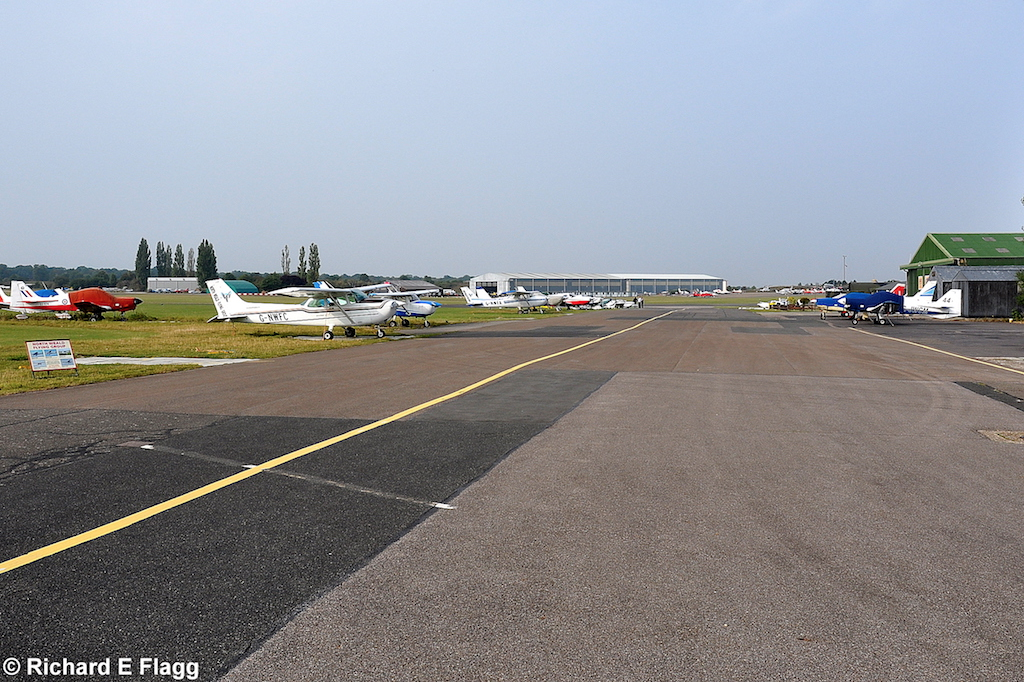 010Taxiway at the centre of the airfield. Looking west near 'The Squadron' - 19 September 2009.png