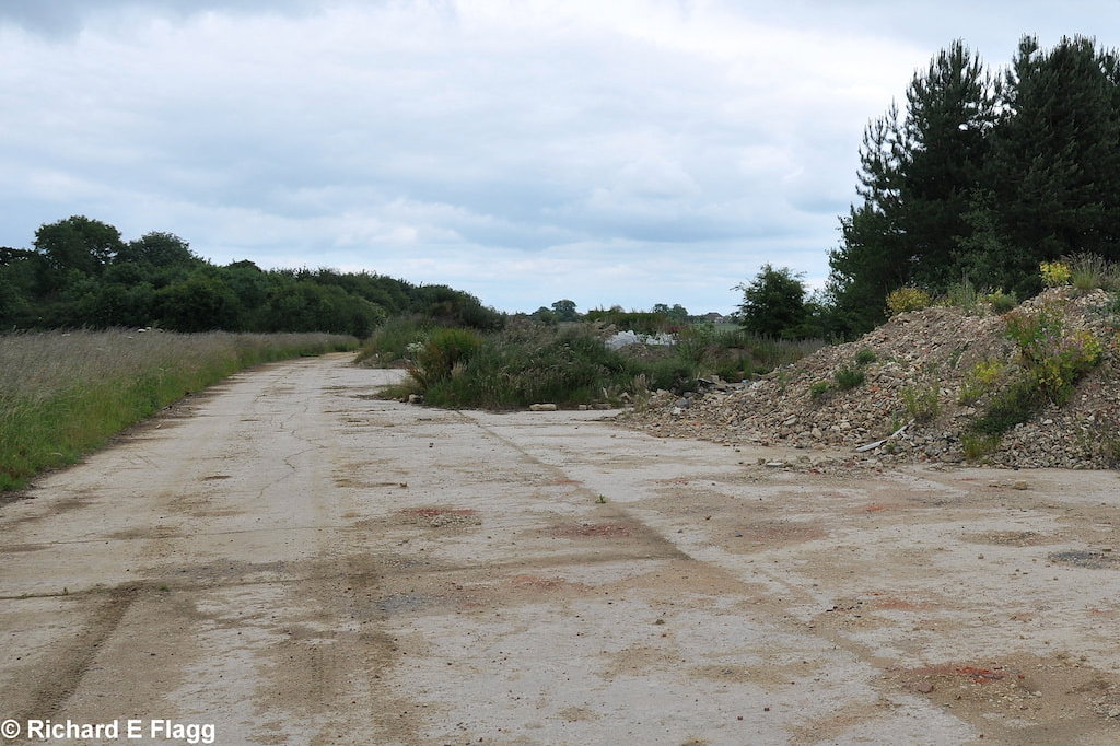 009Taxiway at the north of the airfield. Looking north east from the runway 15 threshold - 21 June 2009.png