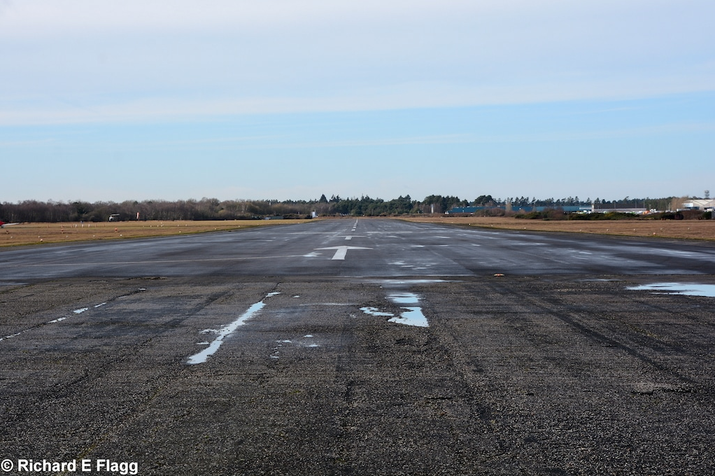 004Runway 08:26 (now 07:25). Looking west from the runway 14:32 intersection - 4 February 2017.png